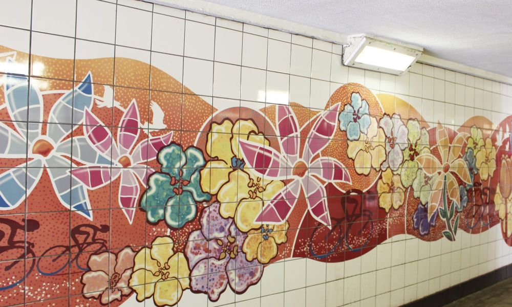 A wall mural in an underpass in Newcastle under Lyme